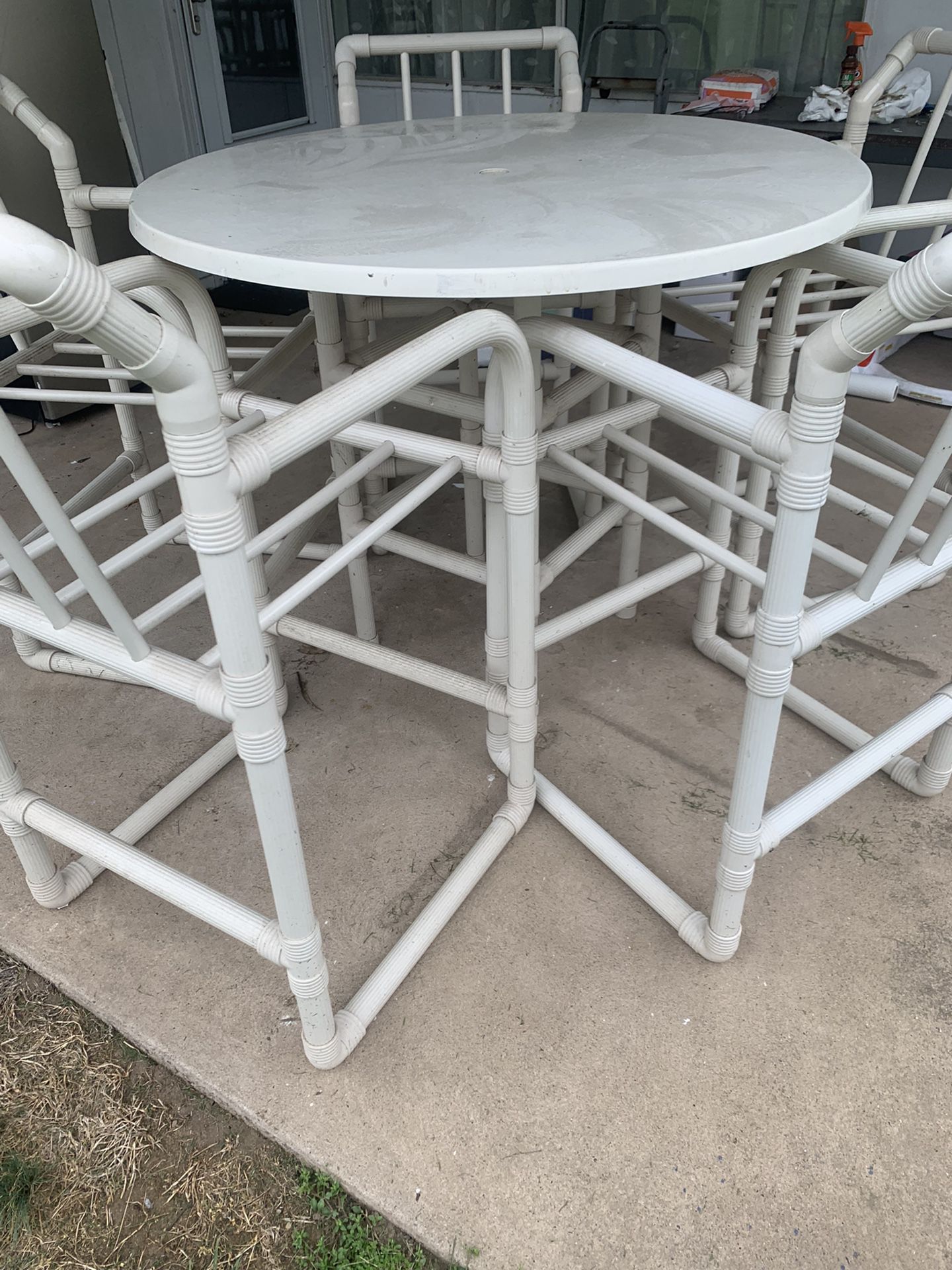  outdoor pvc pub table and five pvc chairs 