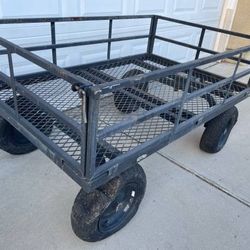 GroundWork 12 cu. ft. 1,400 lb. Capacity Heavy-Duty Towable Utility Cart

Size of the bed: 34 in. W x 52 in. 