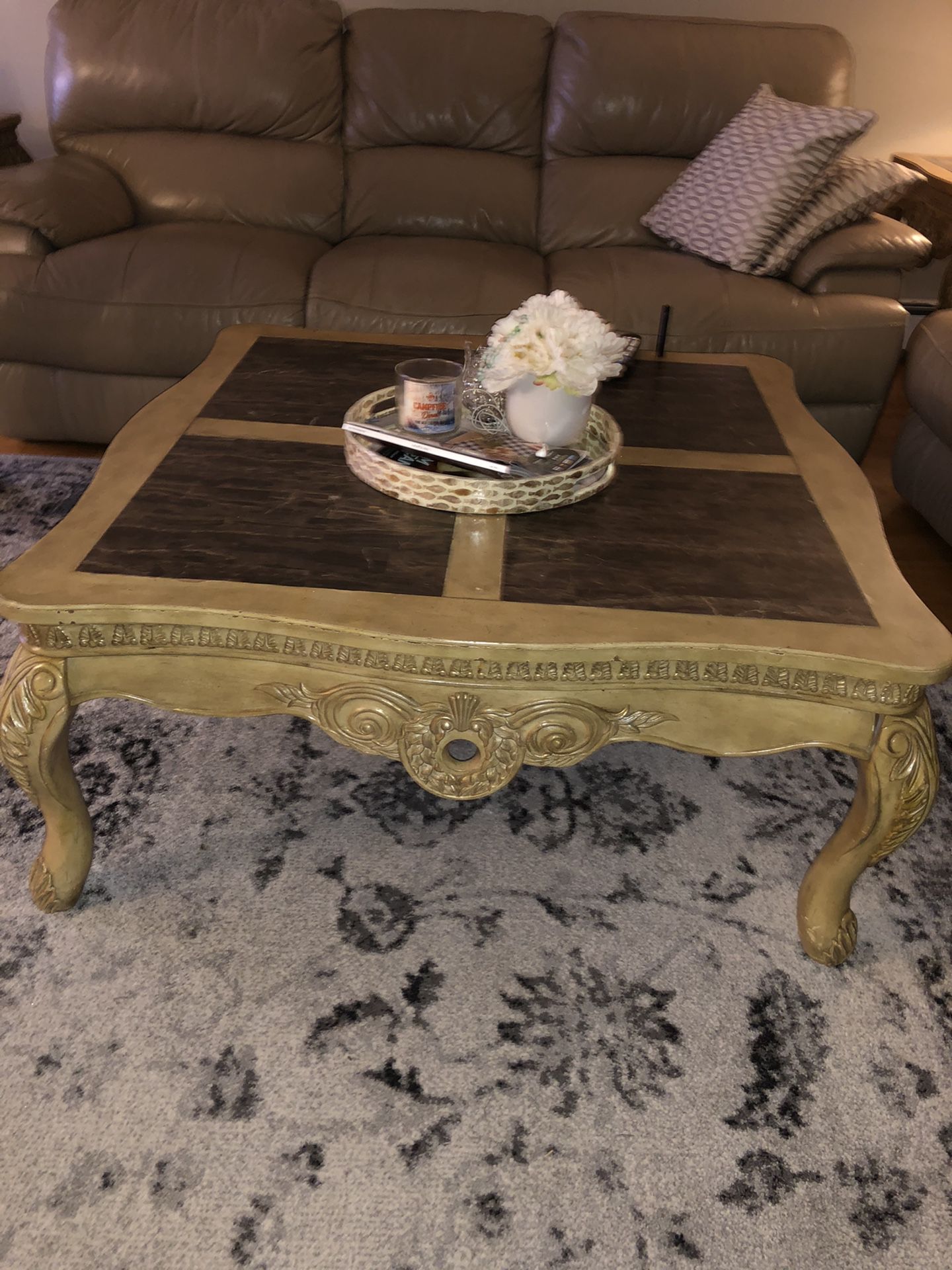 Coffee table with two end tables, console with a mirror
