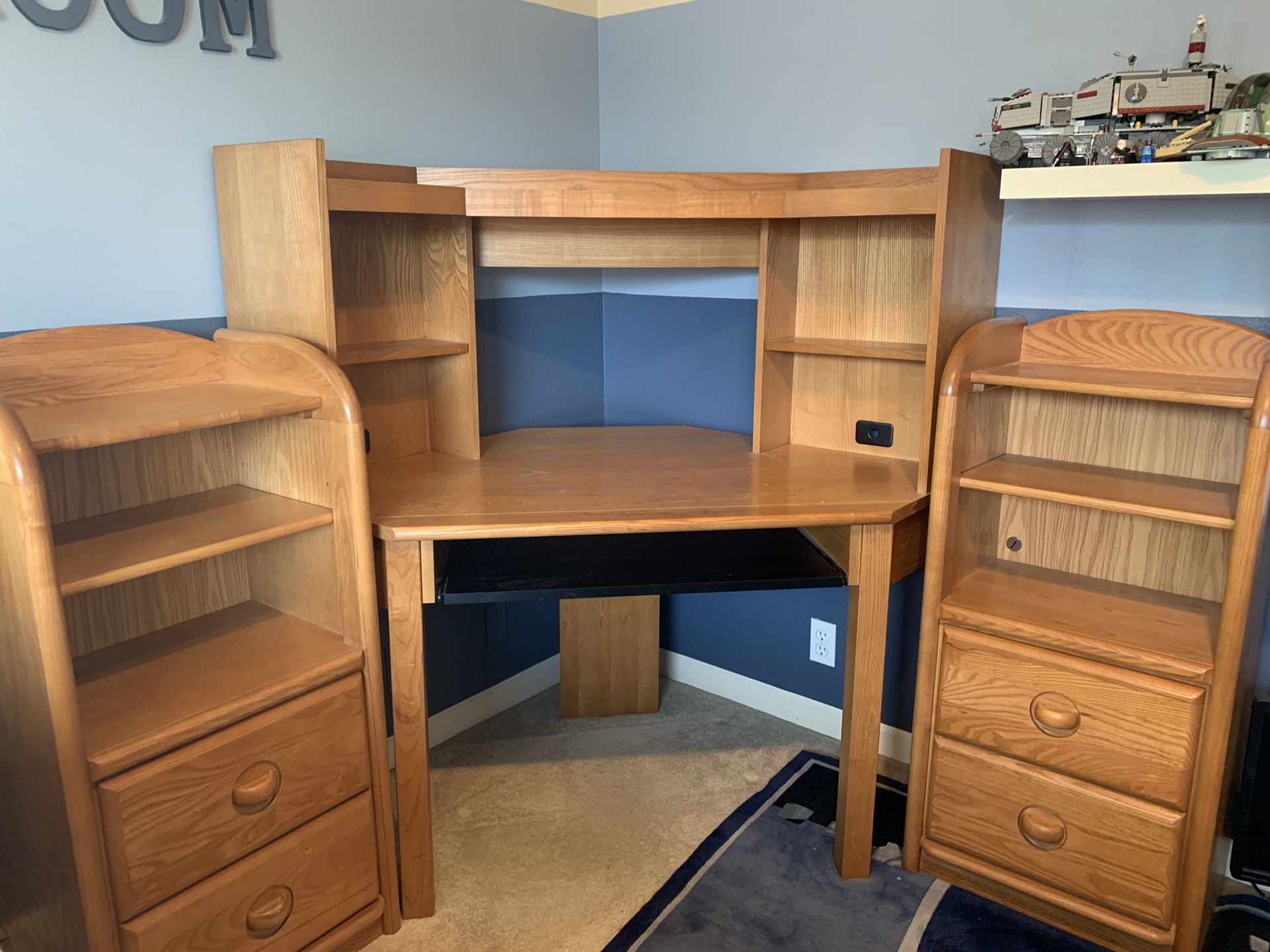Solid oak bedroom set. Corner desk, 2 drawer stacks, chair and headboard. Very well made and in perfect shape.