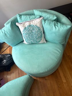 Tiffany blue swivel chair with ottoman