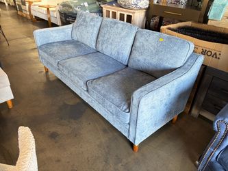 Brand new 78” long blue velvet couch available brand new assembled or in the box