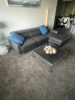 Large adjustable real leather couch