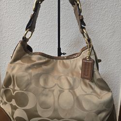 Coach purse.  Used but in good condition.  Asking $80