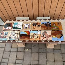 Set of decorative ceramic tiles with various designs. 