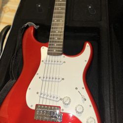 Squier by Fender Stratocaster Electric Guitar – Candy Apple Red + Gig Bag + Fender 15w Amp