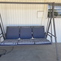 Porch swing - Sturdy - Good condition - Measurements in description - No tears or rips in cushions $75 obo - 67th ave/Bell 