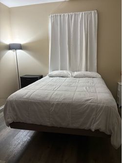Queen size bed (mattress & base included)