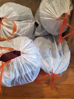 Four Bags Of Women Cloths And Shoes 