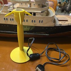 Yellow Miss Sissi Lamp by Philippe Starck for Flos without shade 
Good Condition 8 1/4" tall