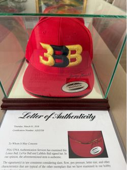 Lamelo Ball, Lonzo Ball, and Lavar Ball signed Hat. PSA authenticated with Frame.