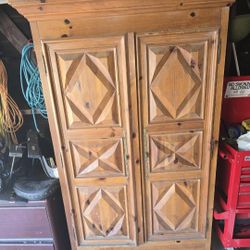 Large Wooden Cabinet With Carved Front Doors