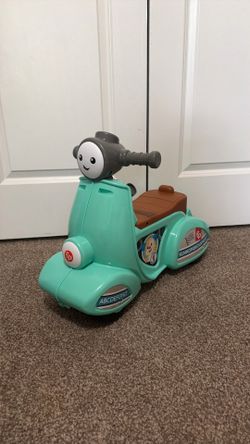 fisher price laugh and learn scooter