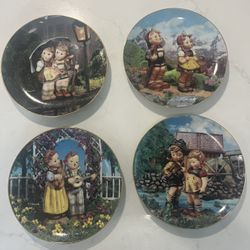 (4) MJ Hummel Collectable Decorative Wall Plates