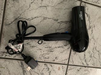 a black Conair 1875-watt ionic ceramic hair dryer