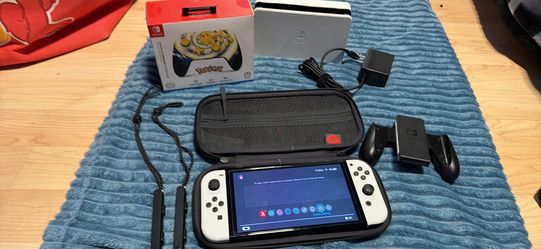 Nintendo switch oled with controller, case, docking station, charging cord, memory card and case no trades cash only see my other listings for more ga