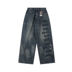 Balenciaga BLCG distressed denim trousers with patchwork details