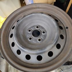 16 Inch Corolla Rims. No Dings with caps.. had them on my 09 prius for a few years switched back to stock