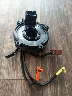 25554-7Z801 is a genuine OEM steering wheel clock spring