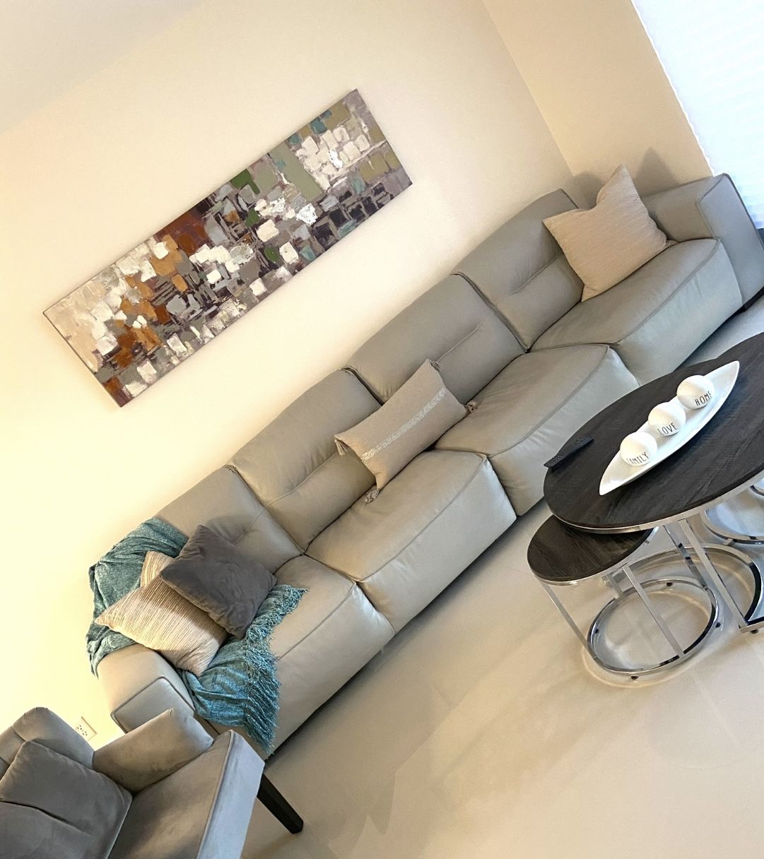 Long And Comfy Leather Sofa with Nesting Tables