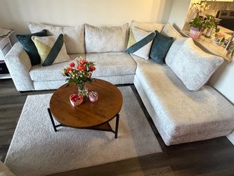 Light Gray Fabric L-Shaped Sectional Sofa with rug and coffee table