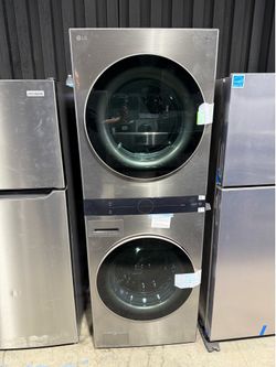 Brand new LG WashTower Stacked SMART Laundry Center 4.5 Cu.Ft. Front Load Washer & 7.4 Cu.Ft. Gas Dryer in Graphite Steel