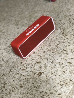 G by guess red and white speaker