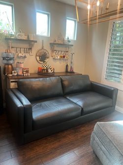 Two chairs, ottoman, and sofa