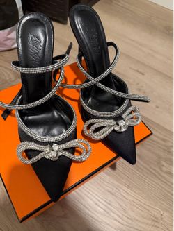 Black and clear heels