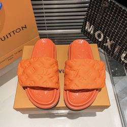 Orange Engraved Repeating Louis Vuitton Logo Slides Women