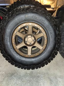 5 rims and tires for Jeep tires are practically new Wrangler JK