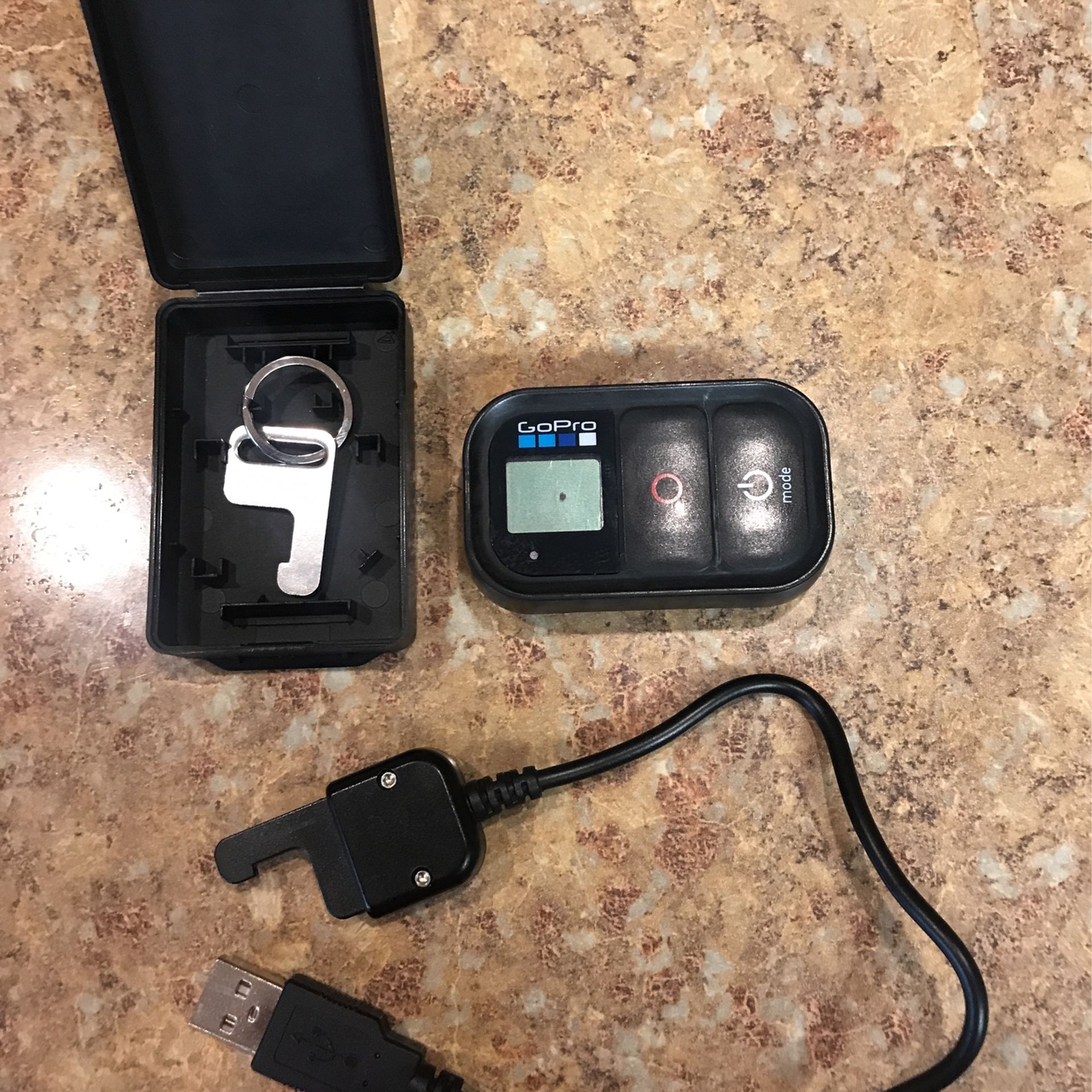 GoPro Remote With Charging Cord.
