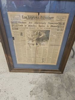 Framed newspaper