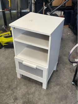 white IKEA bedside table