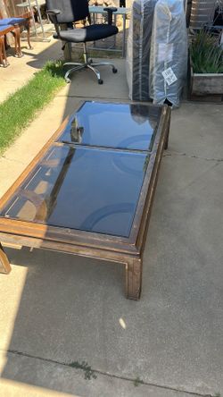 Table with inside slots for decor.