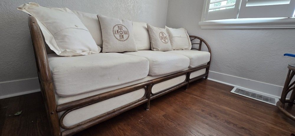 Beige couch w/ wood frame