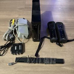 Black Wii With 2 Remotes, All Cables Includes And Fun Games!