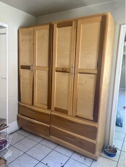 Wood closet , excellent condition