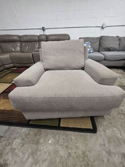 Oversized Gray Fabric swivel Cuddler Chair
Delivery Available!