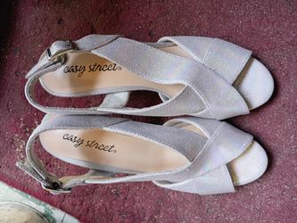 A Sexy Woman's New Silver Glittery Short Heels