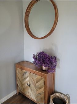 Cabinet and large mirror.  Wooden