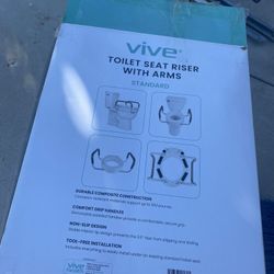 Toilet seat riser with arms Vice