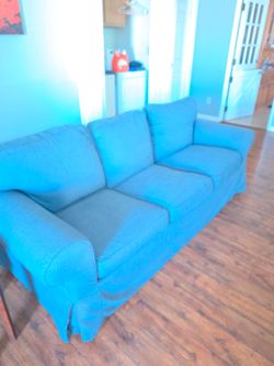 Couch with a three covers