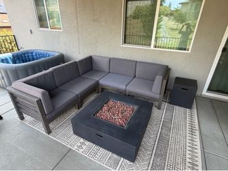 Outdoor patio set with fire pit