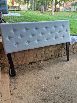 Upholstered light gray queen size bed headboard