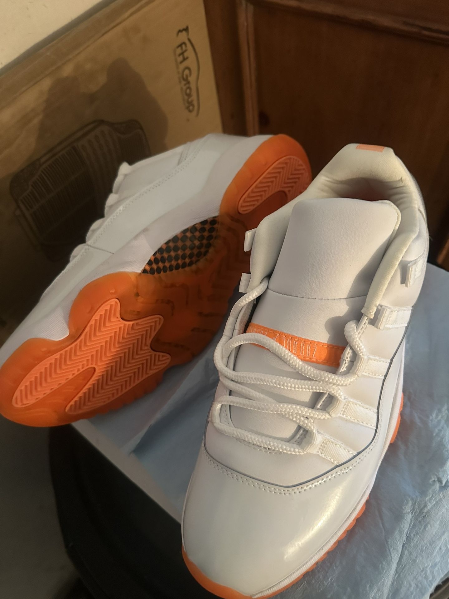 Jordan 11 Low Tangerine