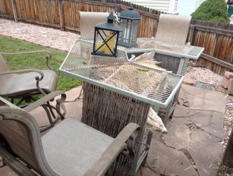 Outside Table With Chairs And It Comes With Umbrellas For The Table