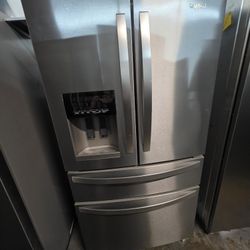 WHIRLPOOL 4 DOOR STAINLESS STEEL REFRIGERATOR 