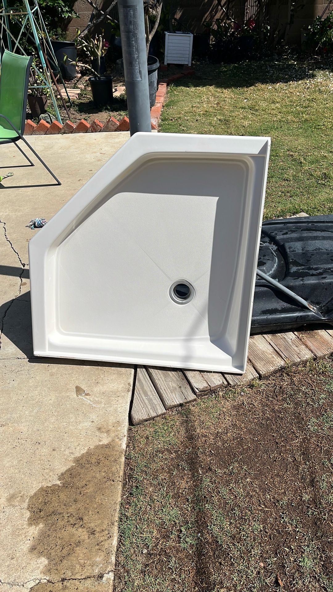 Fiberglass corner shower pan