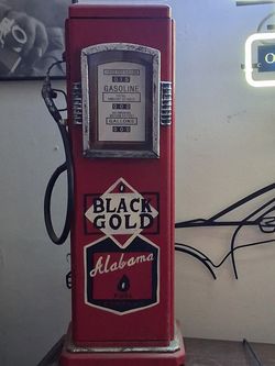 Gas pump  wooden.  Decorated piece